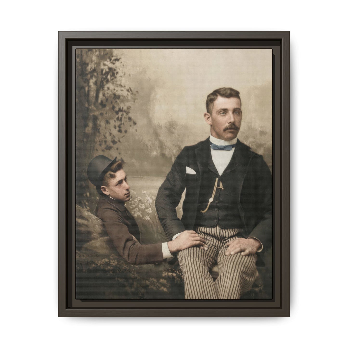 Historical companion portrait showing a seated man in formal dress and a reclining man in dark clothing in a studio setting