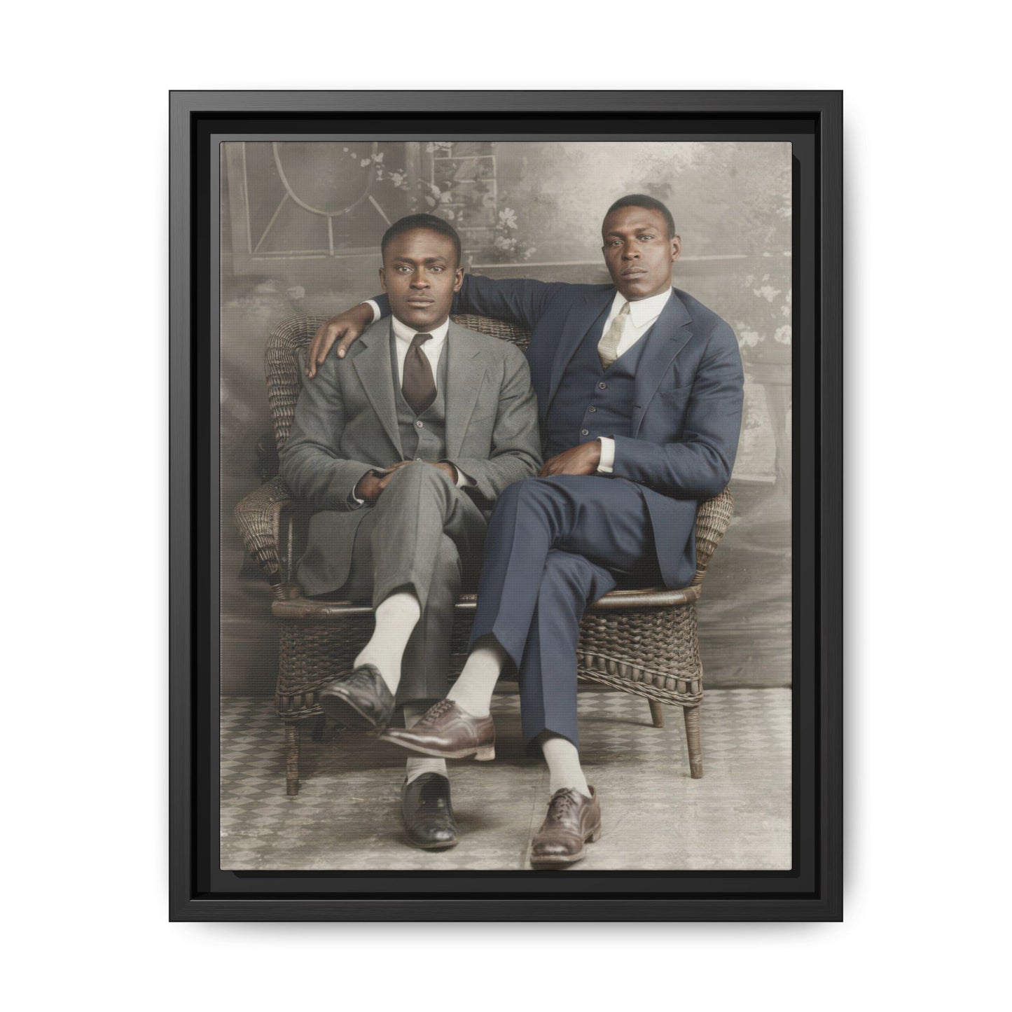 Early 20th century portrait of two men seated in wicker chair studio setting