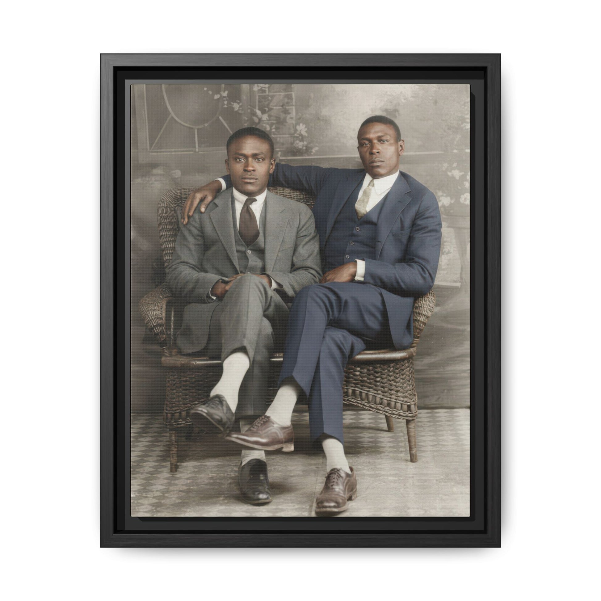 Early 20th century portrait of two men seated in wicker chair studio setting
