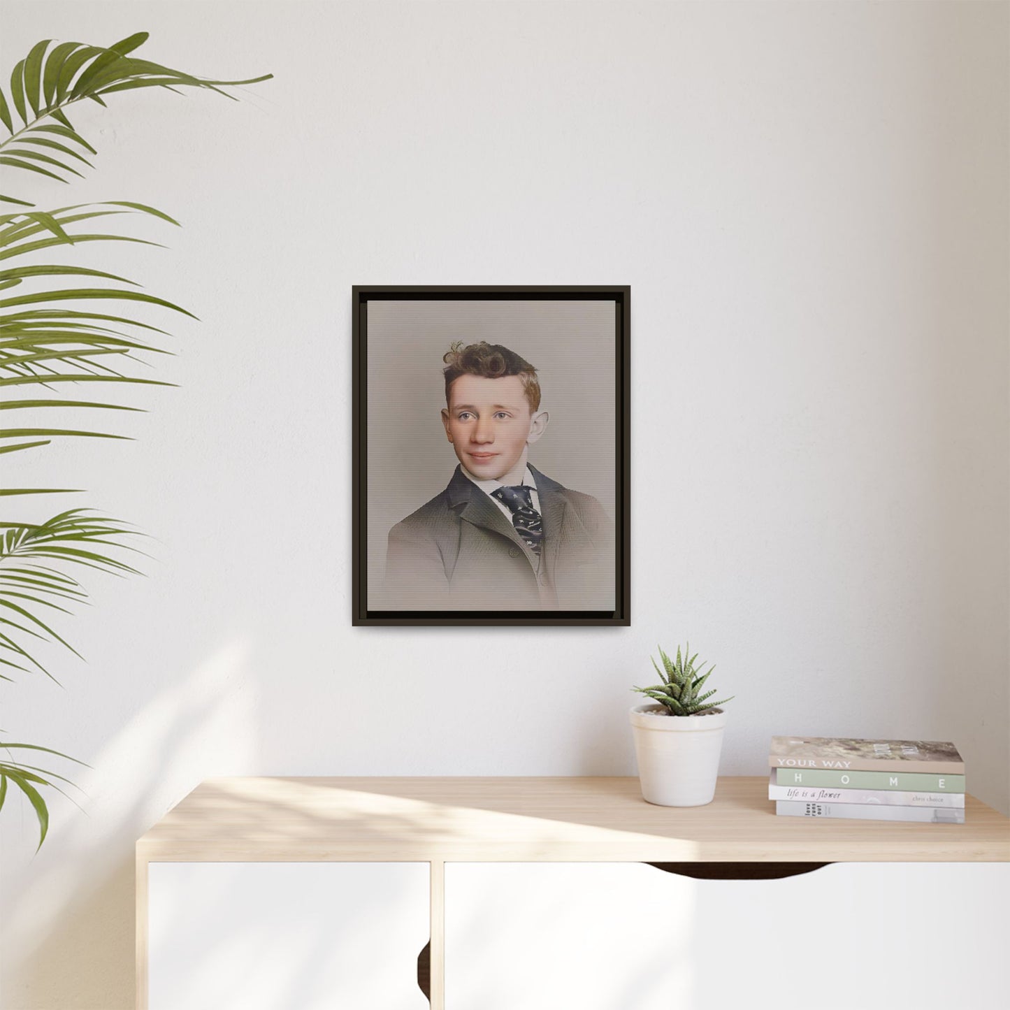 Restored vintage portrait of Leo from early 1900s Milwaukee, Wisconsin, featuring refined elegance and a patterned cravat. Framed matte canvas print celebrating timeless style and individuality.