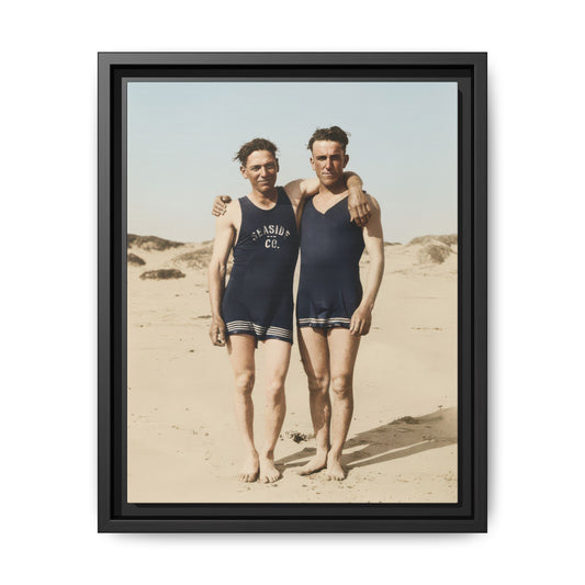 Restored vintage beach photograph of two men standing in matching swimwear 