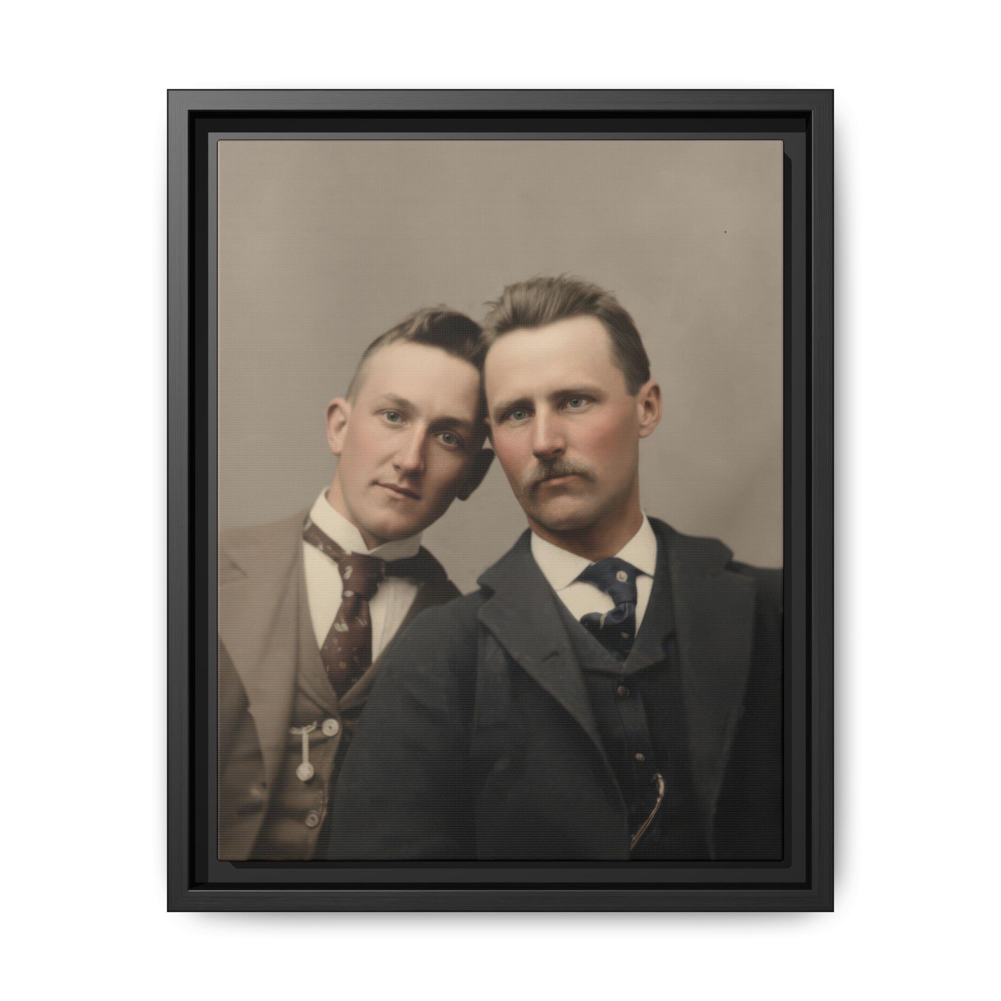 Vintage studio photograph of two suited companions posed closely together