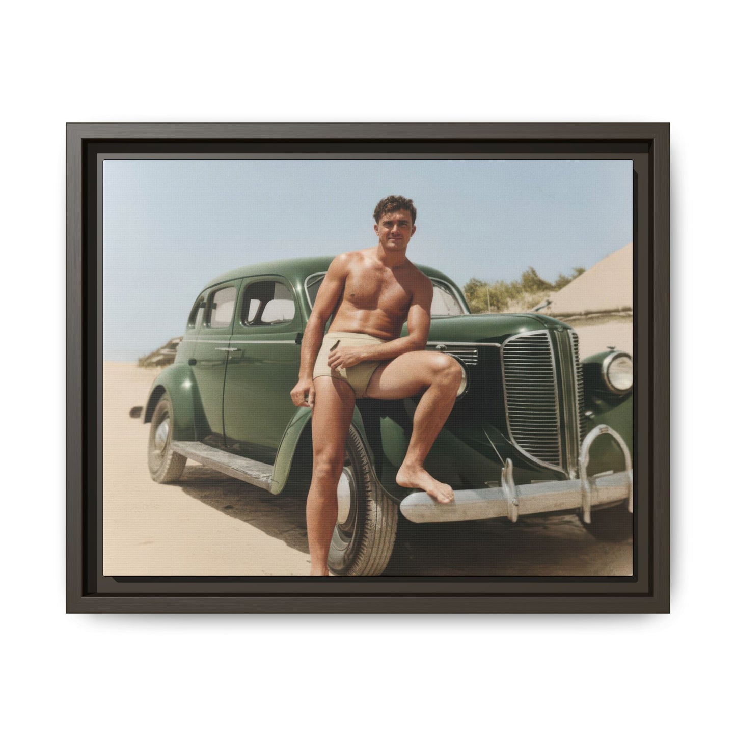 Vintage automotive beach scene with single male figure in archival photograph 