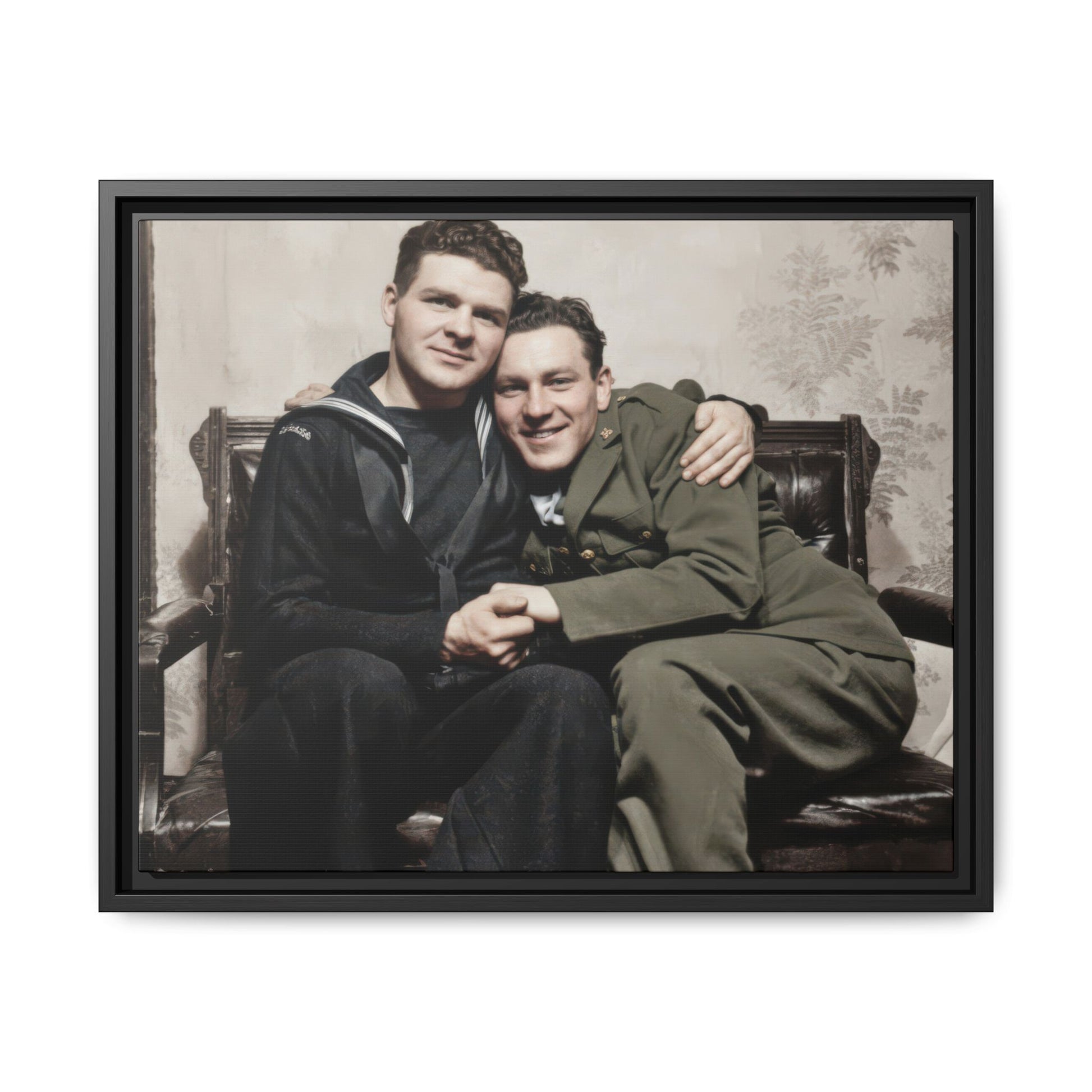 Historical uniformed portrait showing two closely seated figures with joined hands and relaxed expressions