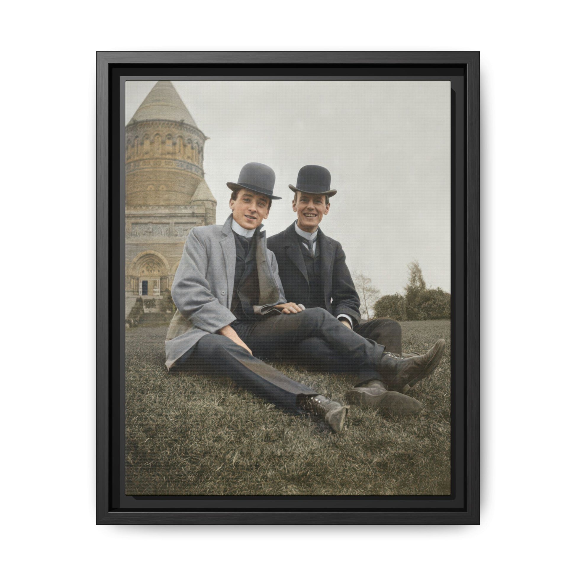 Early 20th-century outdoor double portrait framed canvas wall art with two men seated before a large stone building