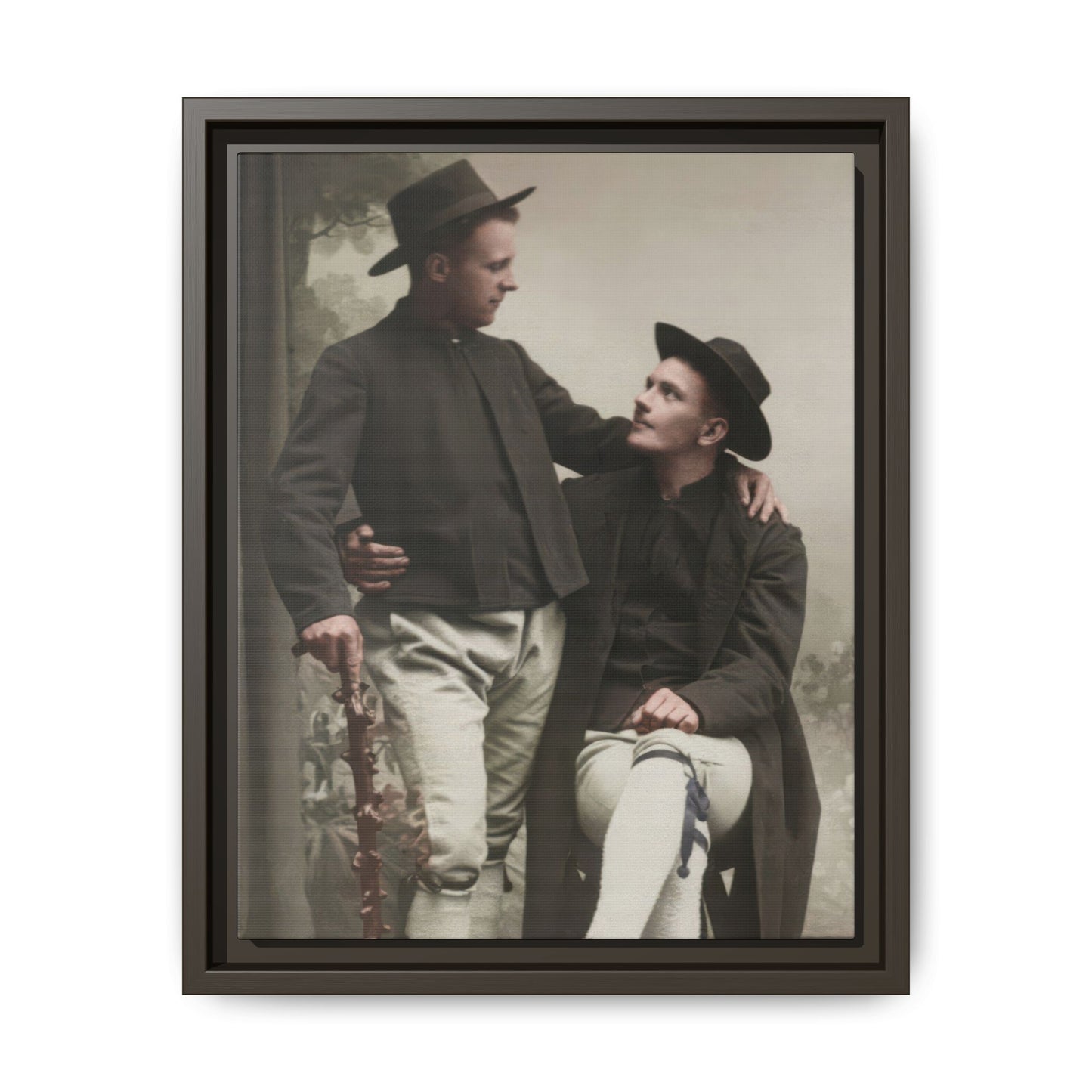 Historical companion portrait showing two closely posed figures in period dress against a painted studio backdrop