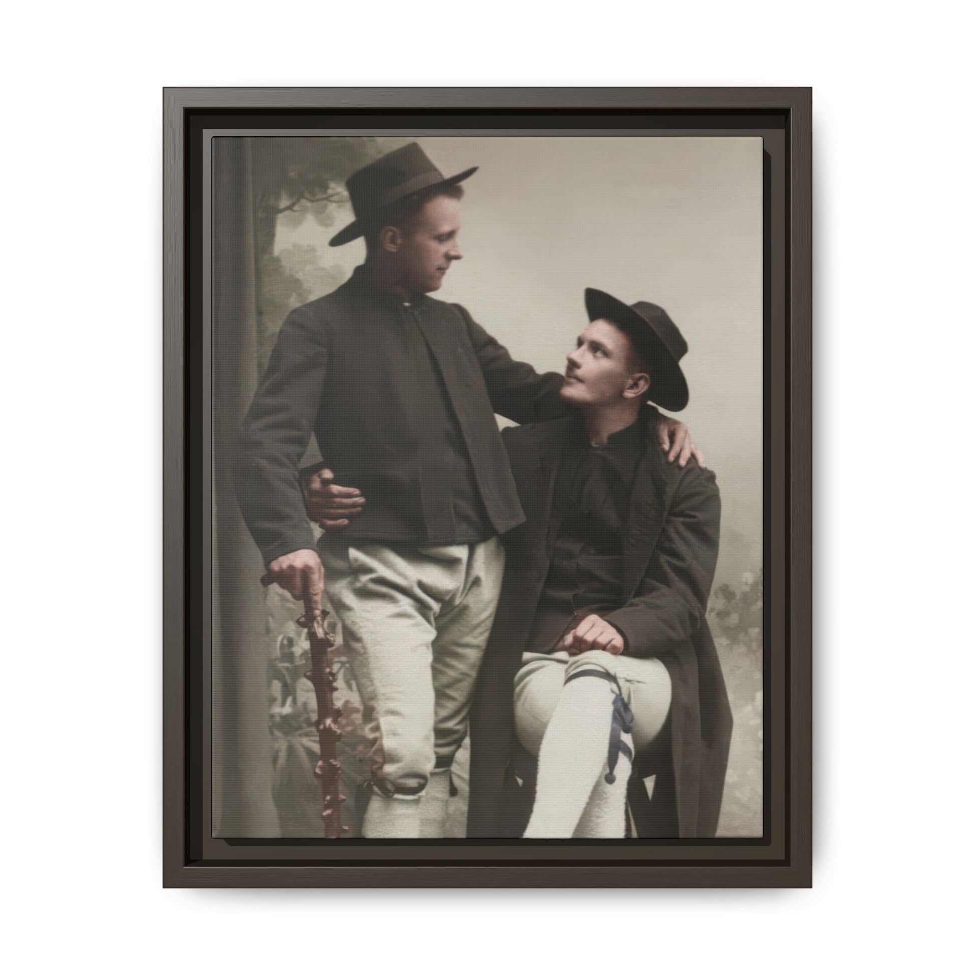 Historical companion portrait showing two closely posed figures in period dress against a painted studio backdrop