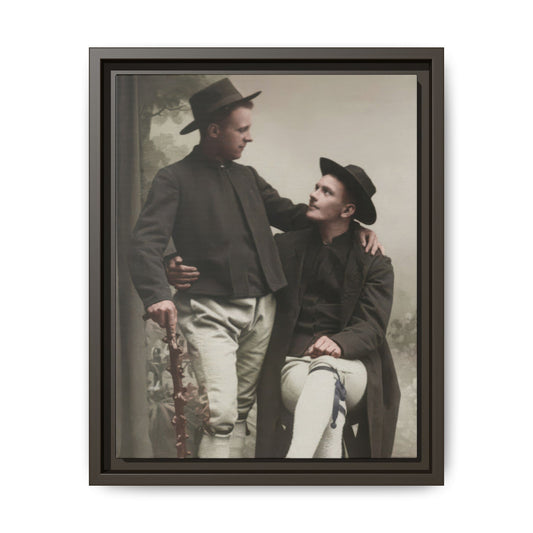 Historical companion portrait showing two closely posed figures in period dress against a painted studio backdrop
