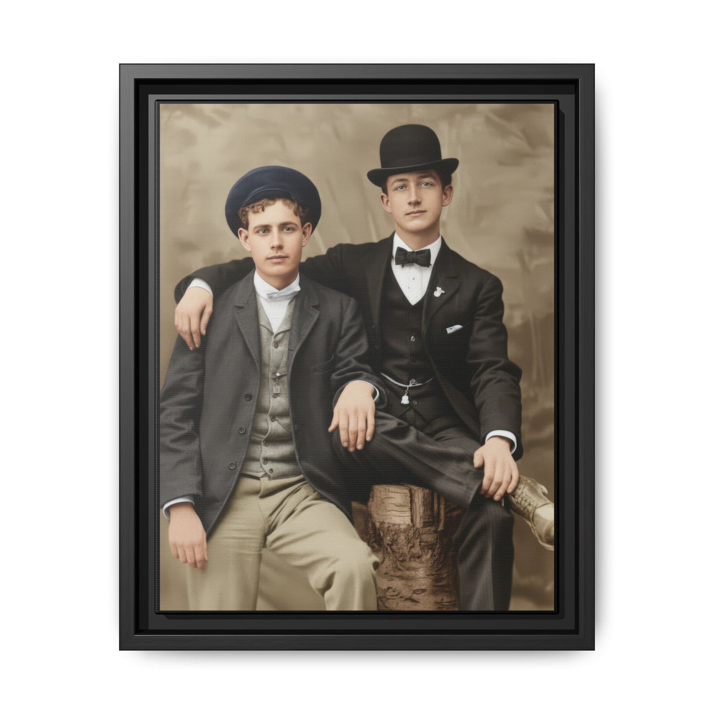 Early twentieth century studio portrait of two young men seated together wearing suits and hats