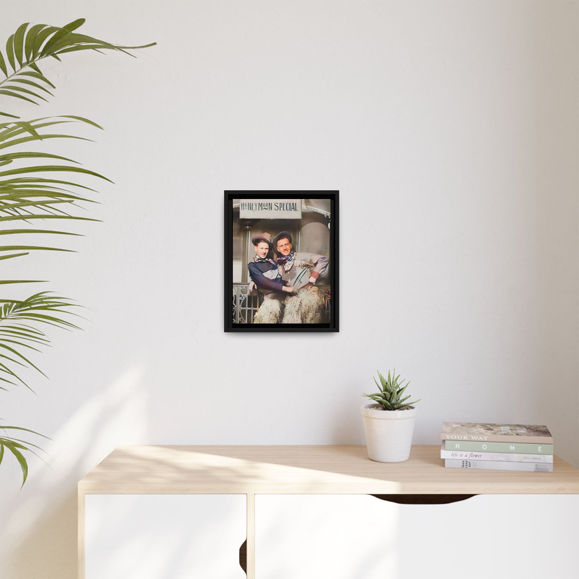 Restored vintage photo of Harry & Earl, a playful gay couple in San Antonio, Texas, under a 'Honeymoon Special' sign