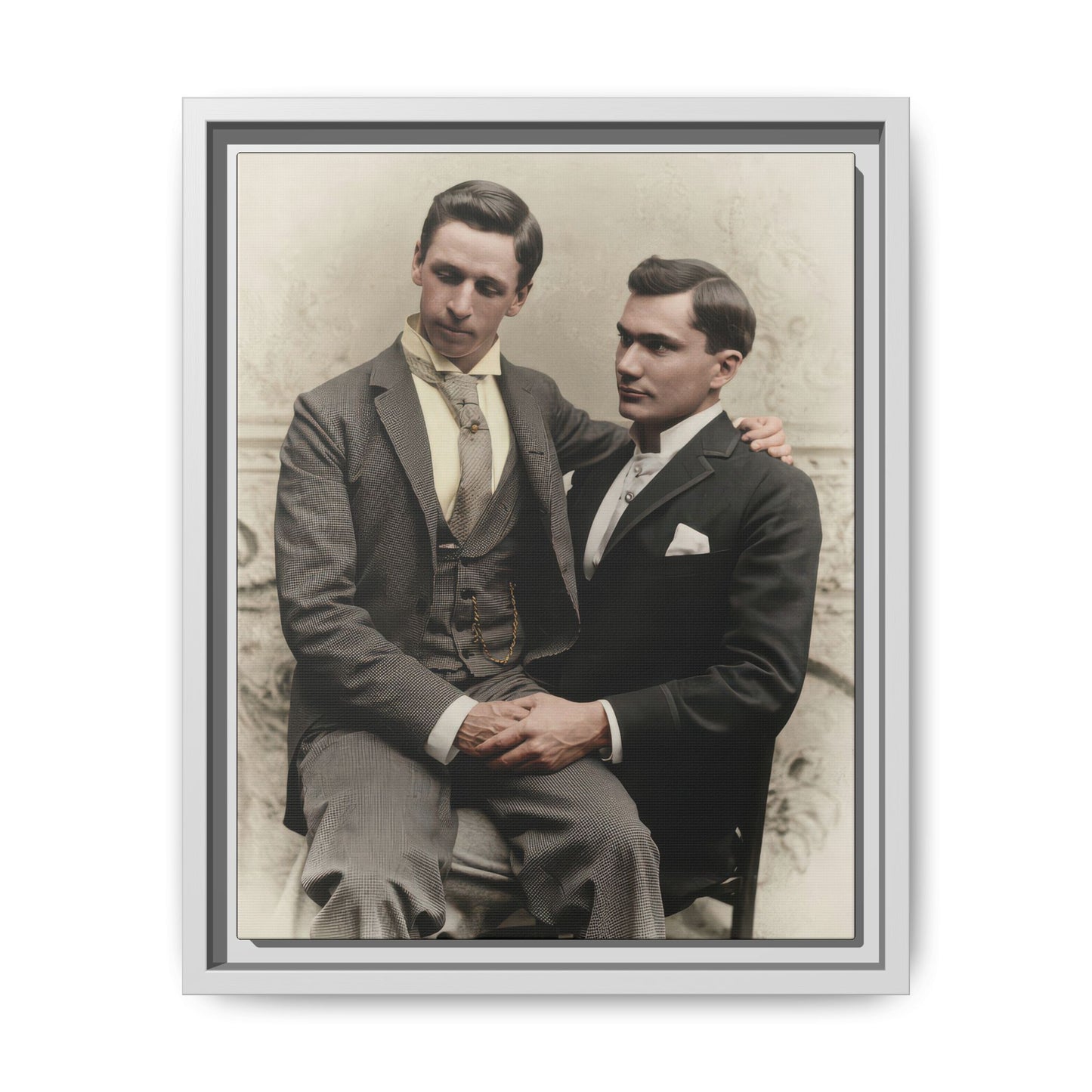 Early 1900s studio portrait with formal menswear and close seated composition
