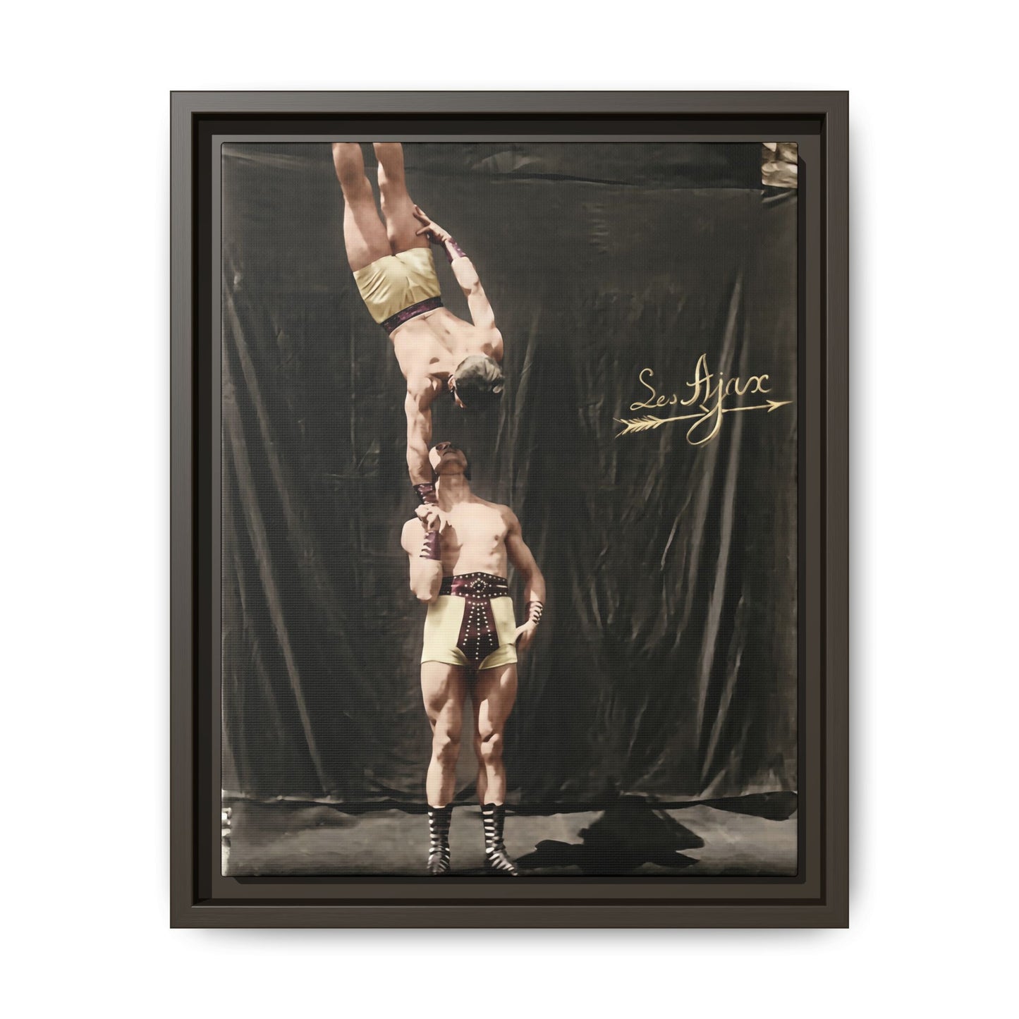 Vintage acrobatic performance photograph with studio backdrop 