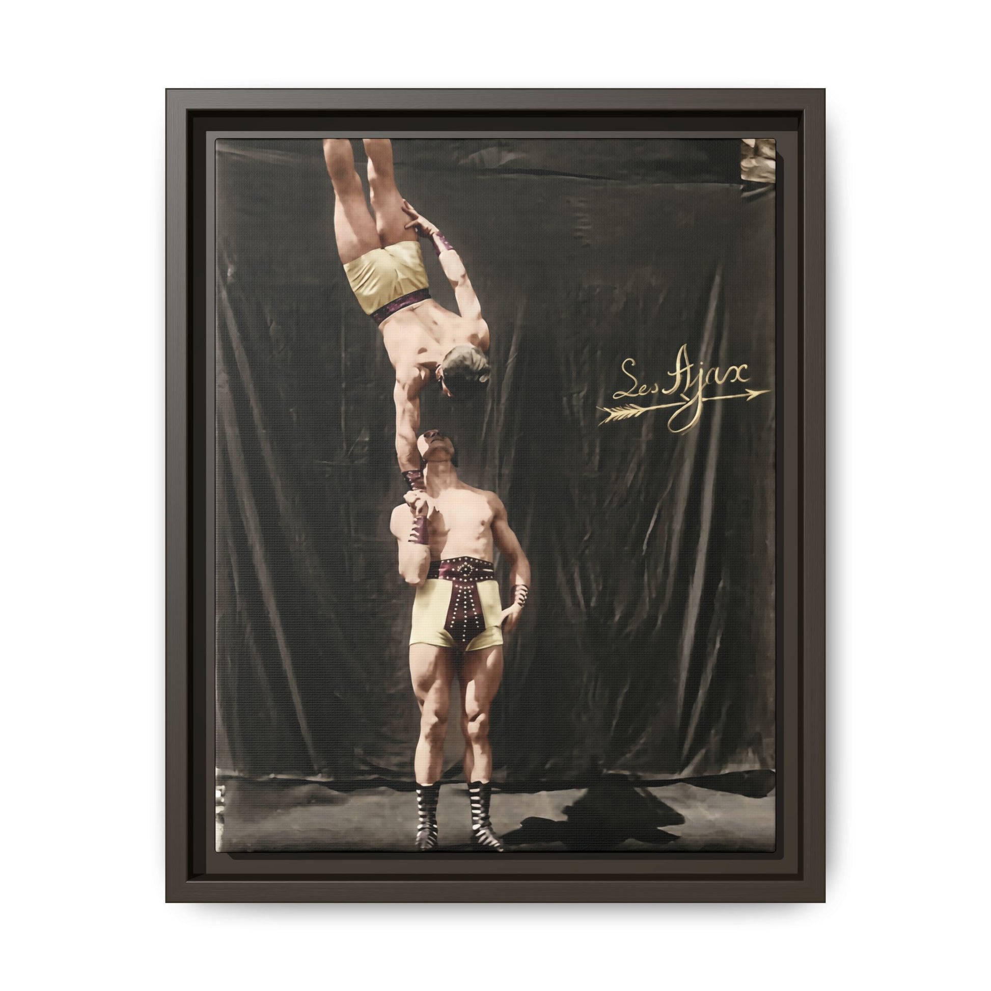 Vintage acrobatic performance photograph with studio backdrop 