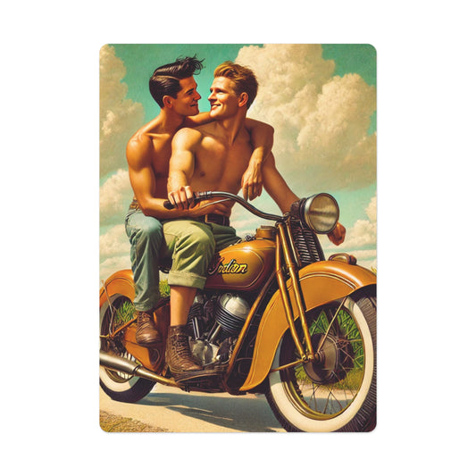 A gay couple on a golden Indian motorcycle, sharing a romantic moment under a serene sky, featured in a Grant Wood-inspired poker card design.