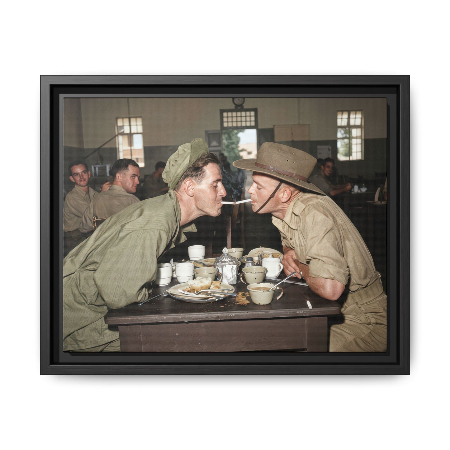 Vintage photo of two men sharing cigarette across table