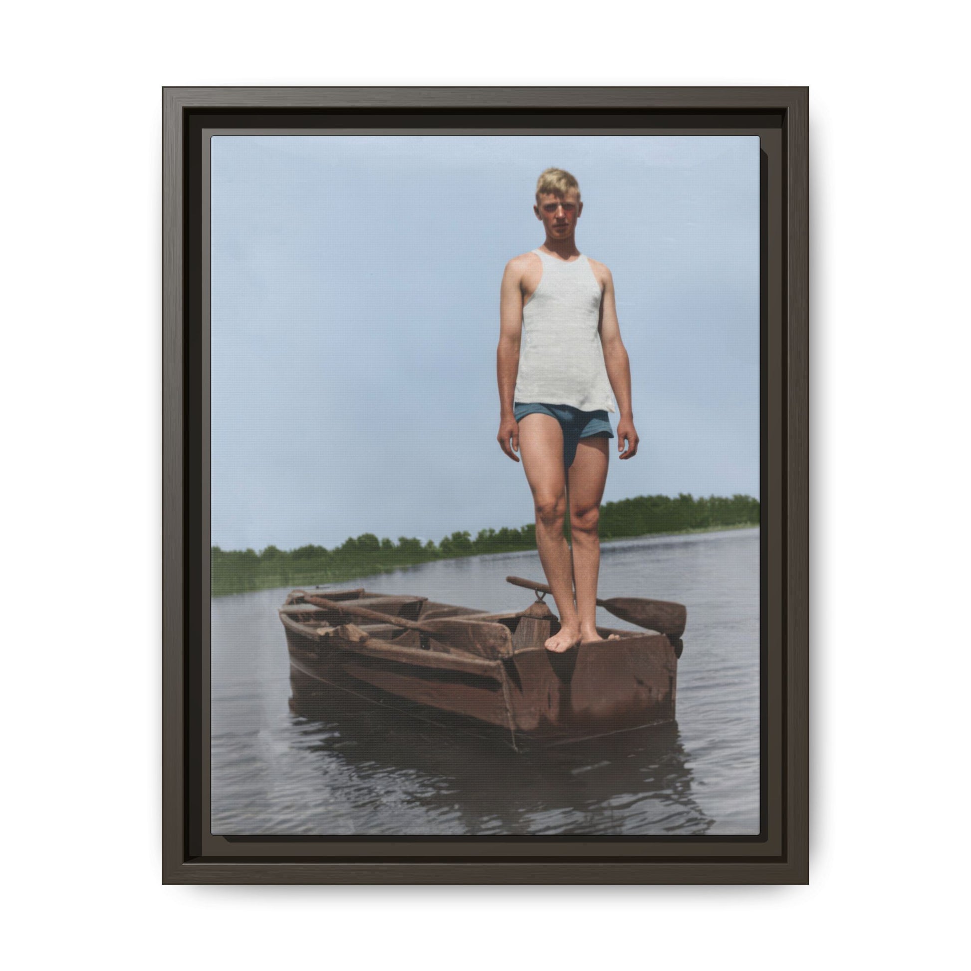 Historical boat portrait with single figure and distant tree line 