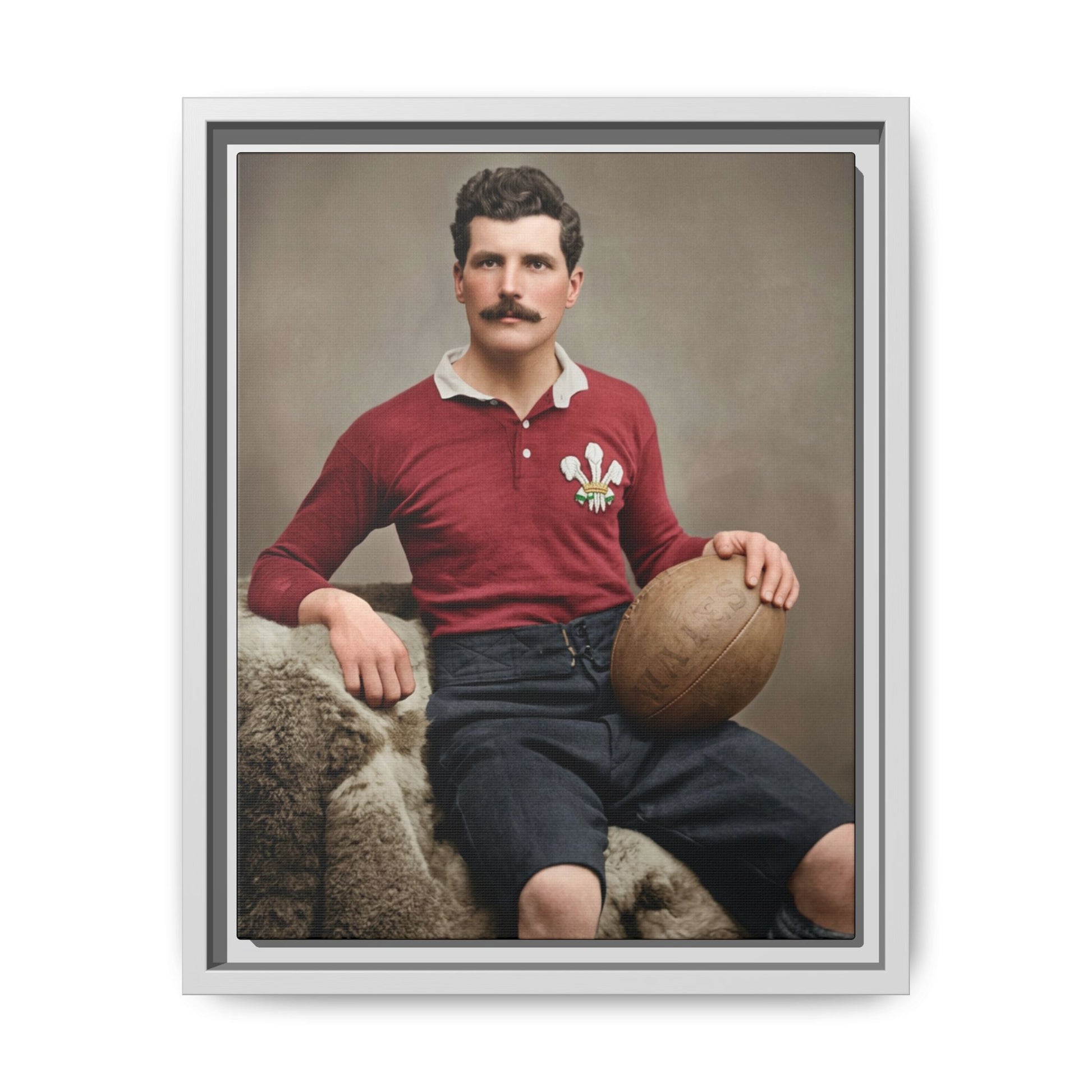 Seated rugby player in quilted shorts reproduced as framed matte canvas wall art 
