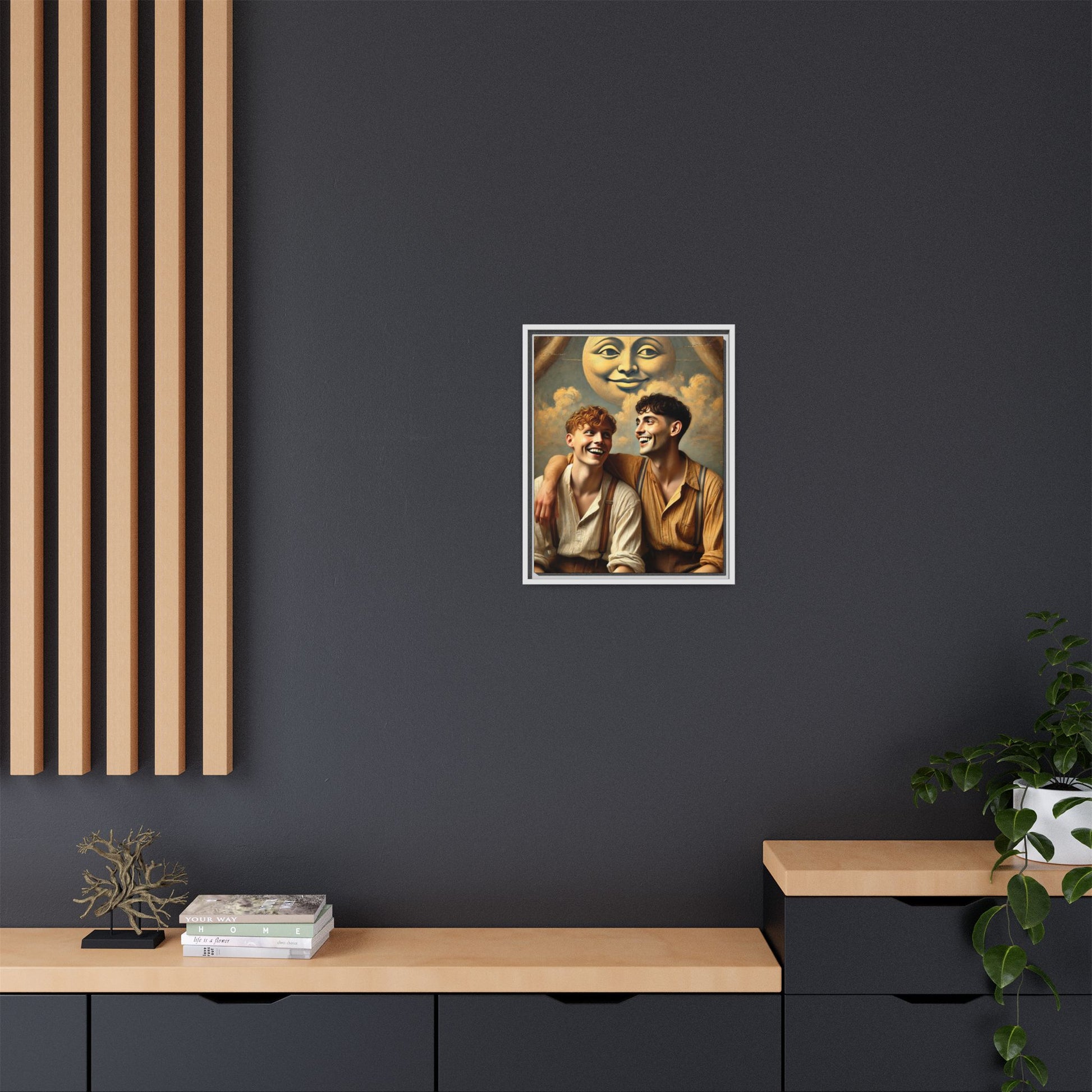 Queer artwork of two joyful young men dressed in vintage clothing with rolled sleeves and suspenders, laughing under a large moon prop in a dreamy studio scene. A celebration of love and resilience reclaimed from forgotten queer histories.