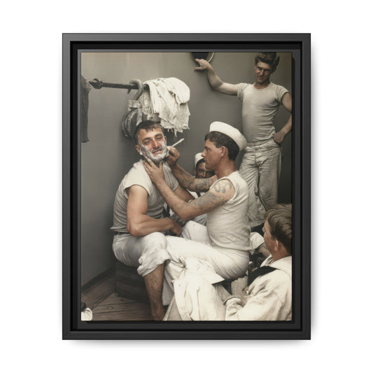 Restored colorized photograph of a tattooed man shaving another man’s lathered face aboard a vessel, with other men nearby.