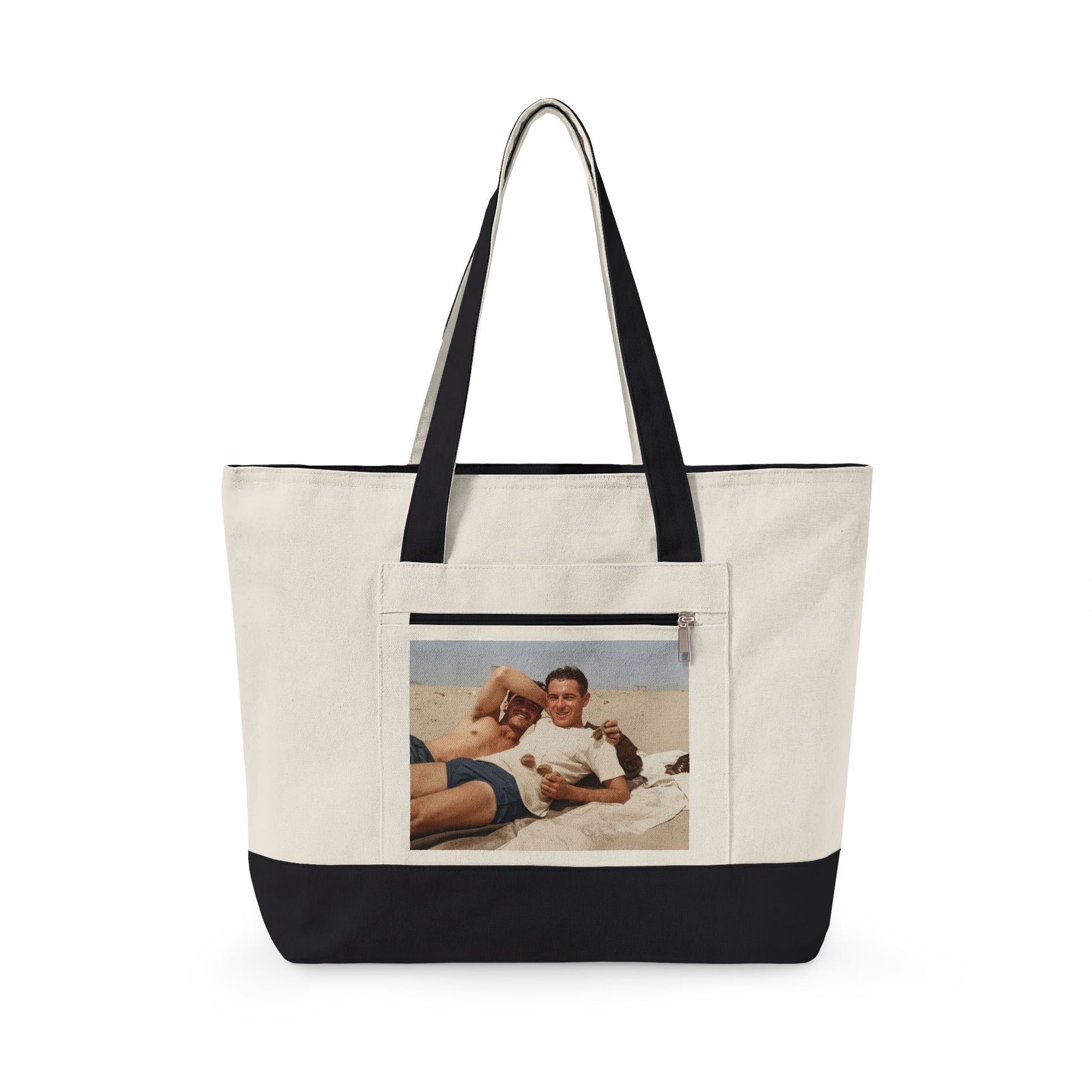 Two men relaxing on beach vintage tote design 