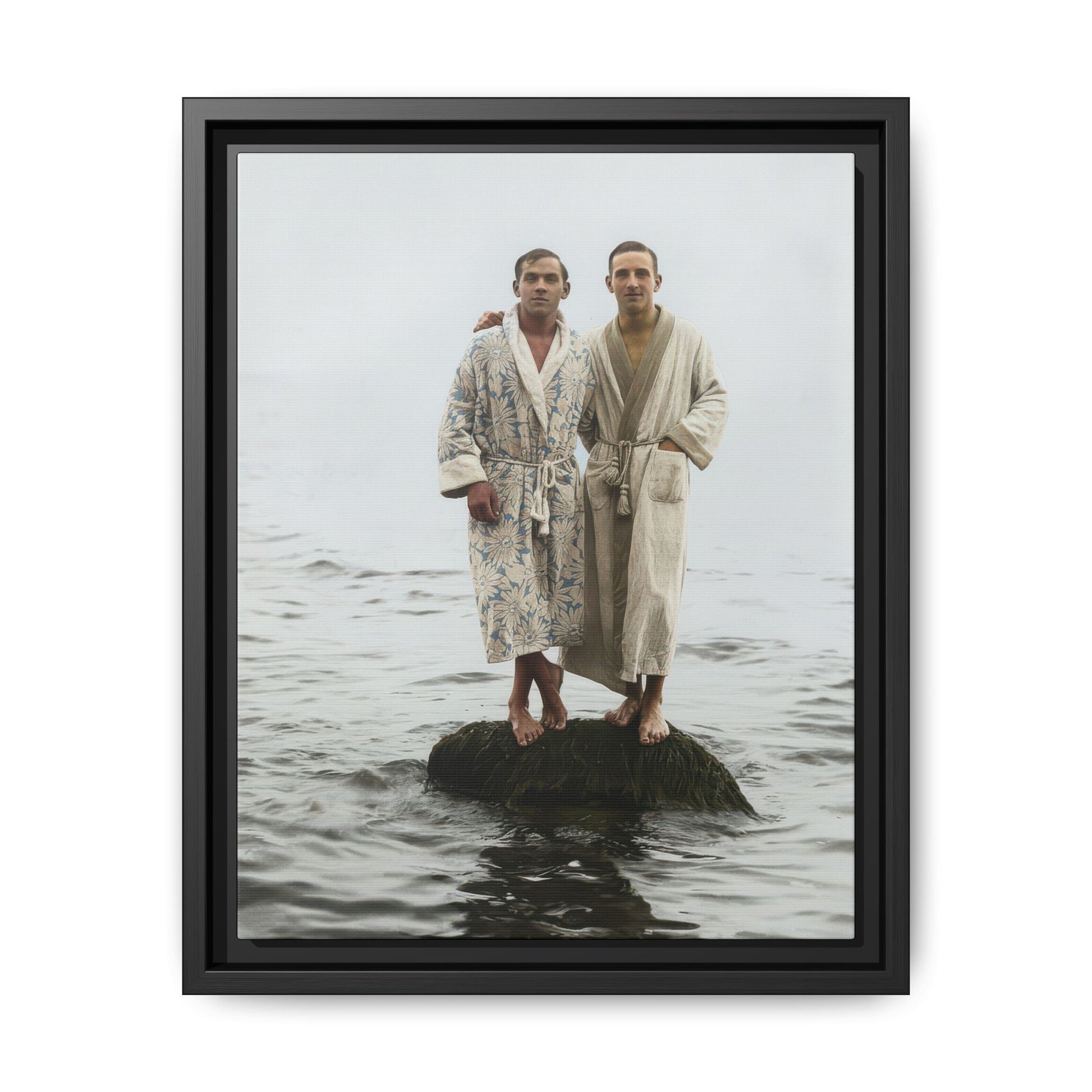 Restored vintage photograph of two men in robes standing on a rock in shallow water 