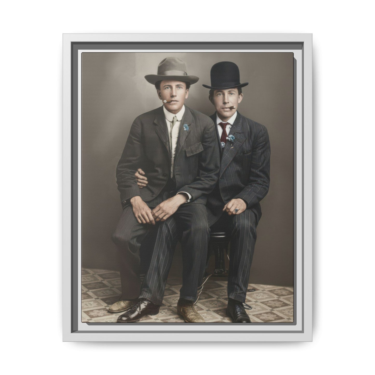 Early 20th century style paired portrait with two men seated closely on a studio chair and a patterned floor