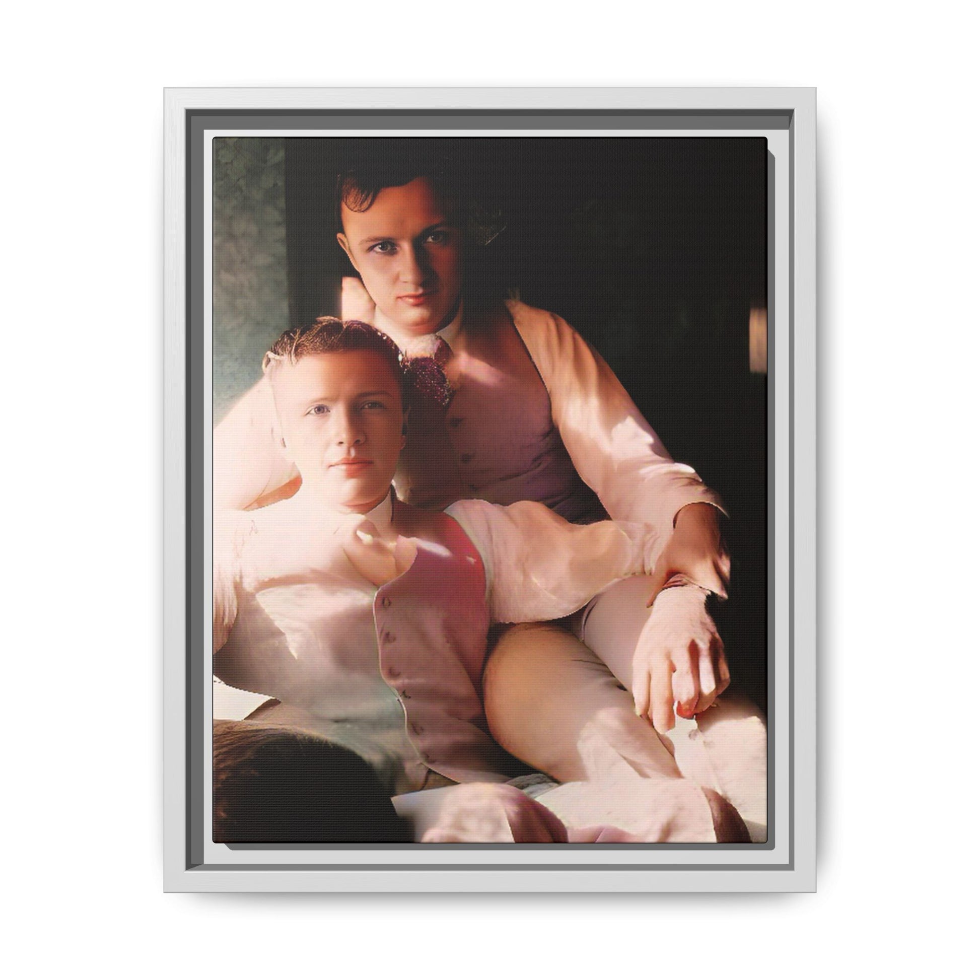 Restored vintage photograph of James and Henry, an early 1900s LGBTQ+ couple from Dayton, Ohio, sharing an intimate, sunlit moment. Framed matte canvas print celebrating love, devotion, and LGBTQ+ history.