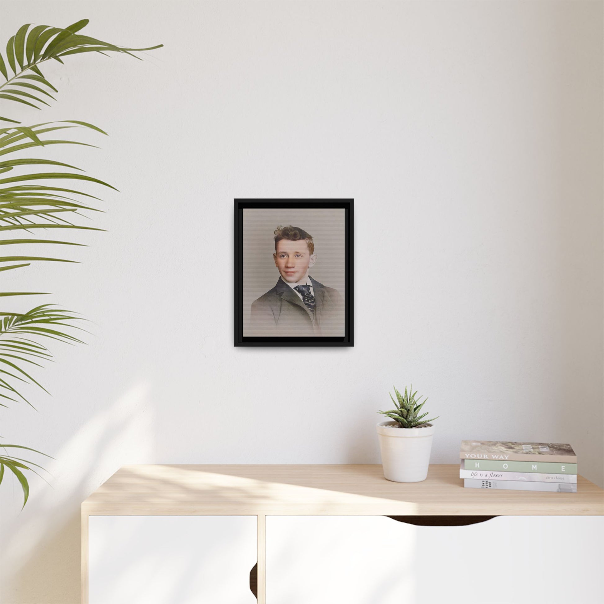 Restored vintage portrait of Leo from early 1900s Milwaukee, Wisconsin, featuring refined elegance and a patterned cravat. Framed matte canvas print celebrating timeless style and individuality.