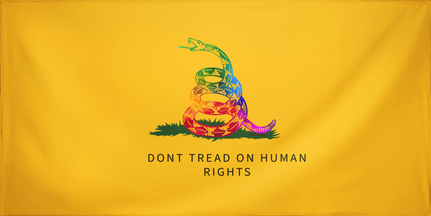 A vibrant reinterpretation of the Gadsden Flag featuring a coiled rainbow rattlesnake on a golden yellow background with the text "Don’t Tread on Human Rights," symbolizing inclusivity, equality, and justice. Don’t Tread on me.